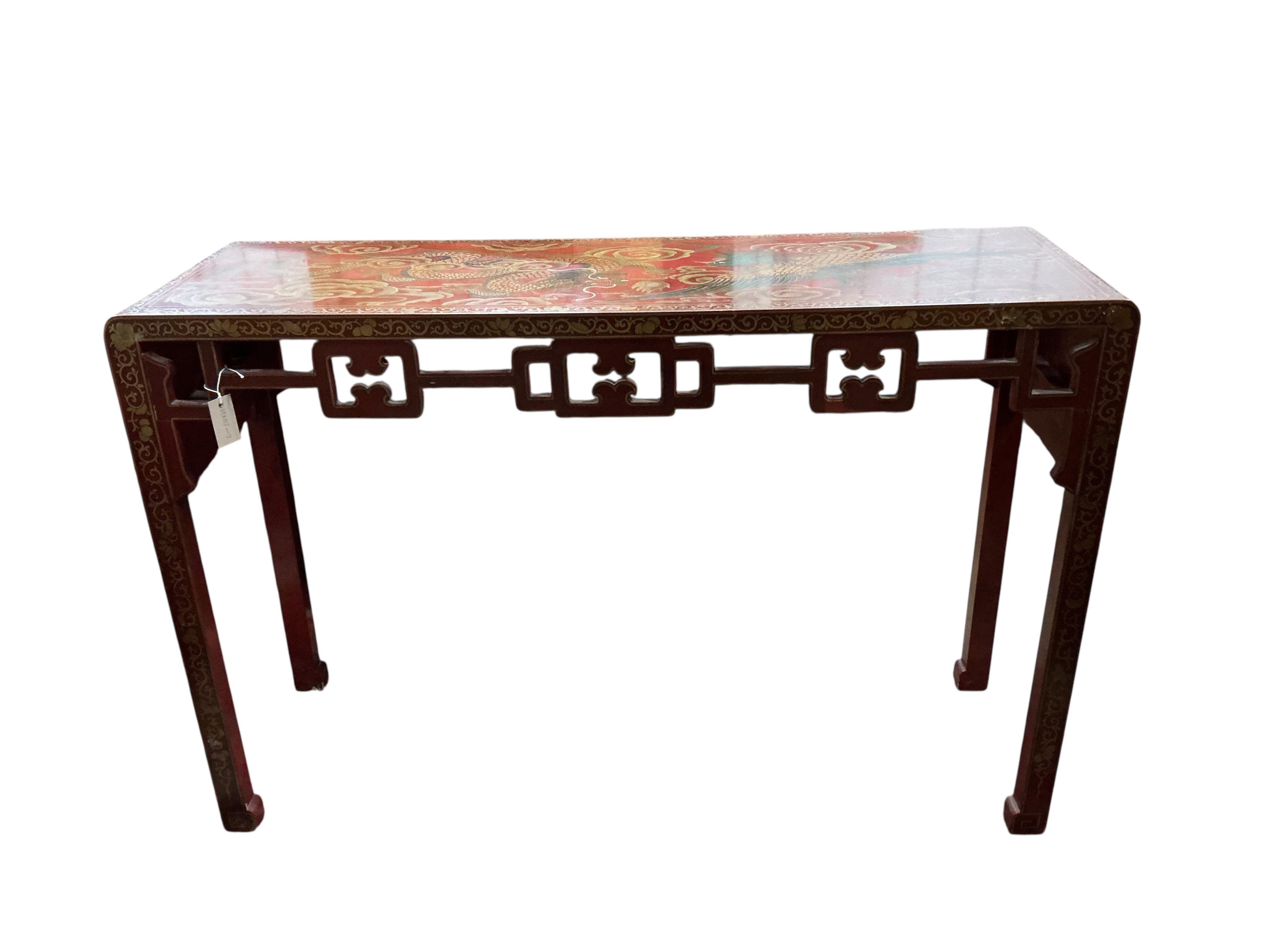 A Chinese scarlet lacquer altar table, width 138cm, depth 43cm, height 92cm